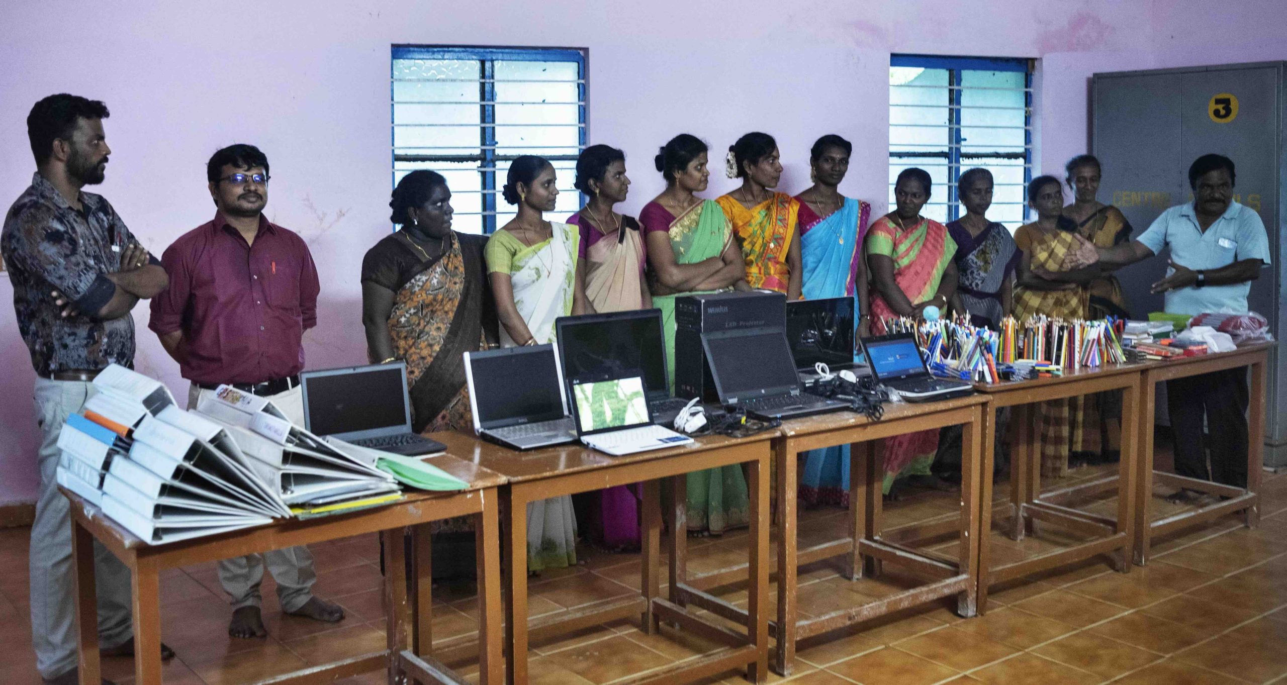Ave Maria School receiving school materials and computers for the computer lab