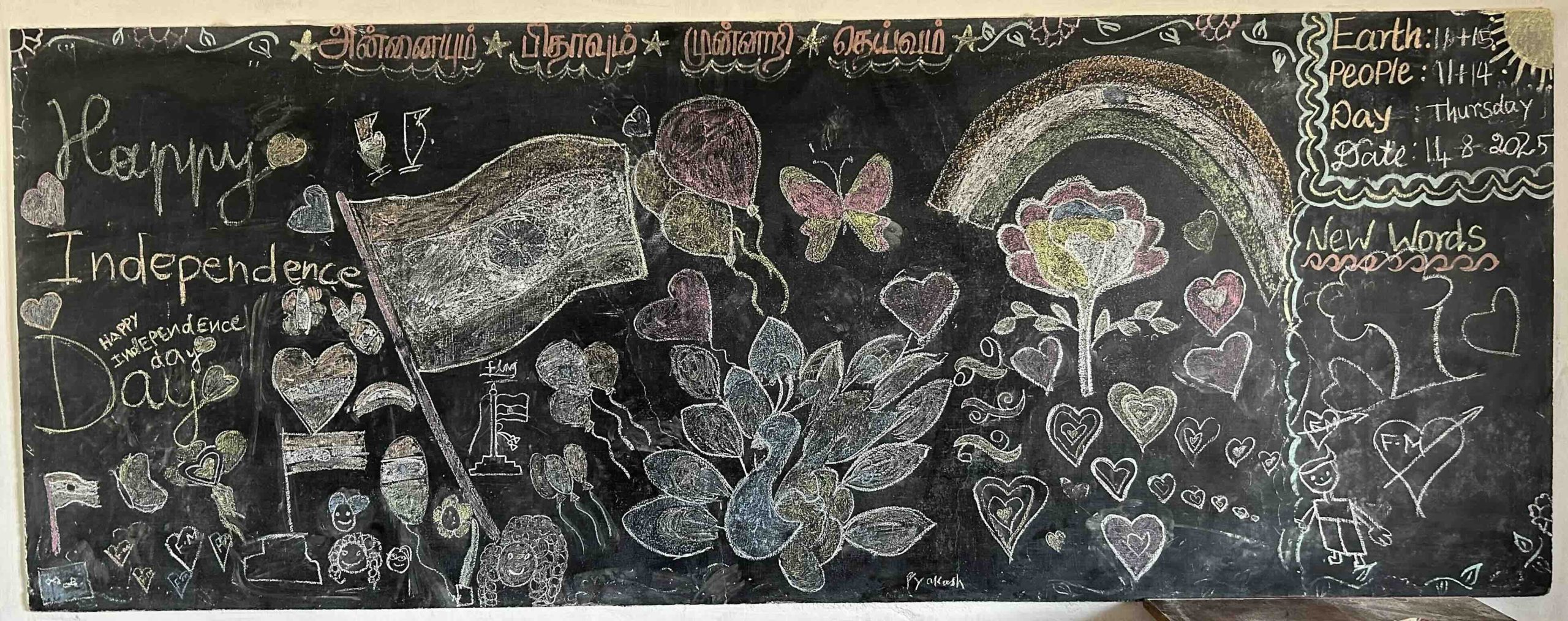 Board full of students' drawings for Independence Day