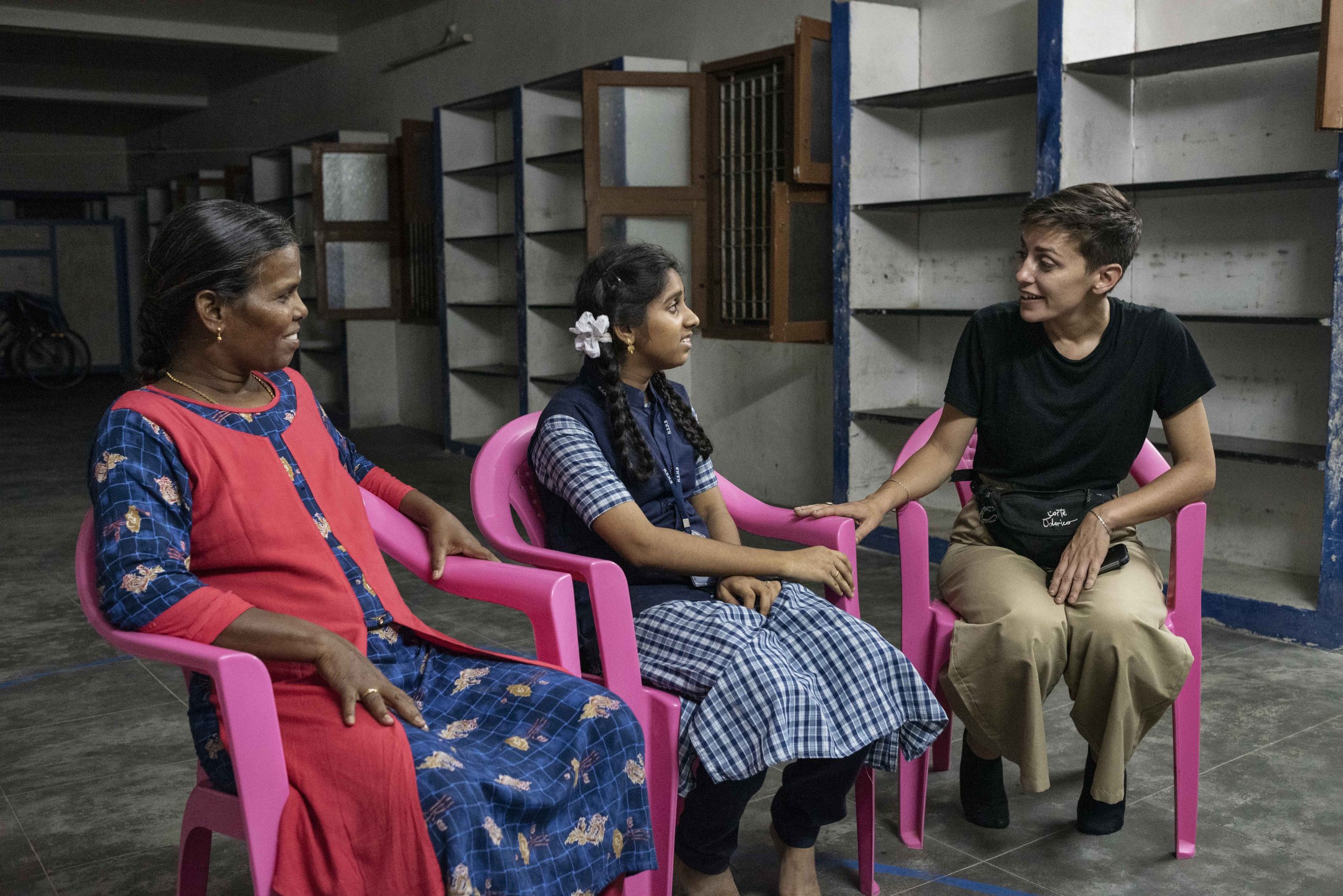 Dharani from the Distance Child Sponsorship program talking with Energia Volunteer Malvina and orphanage manager Thangam