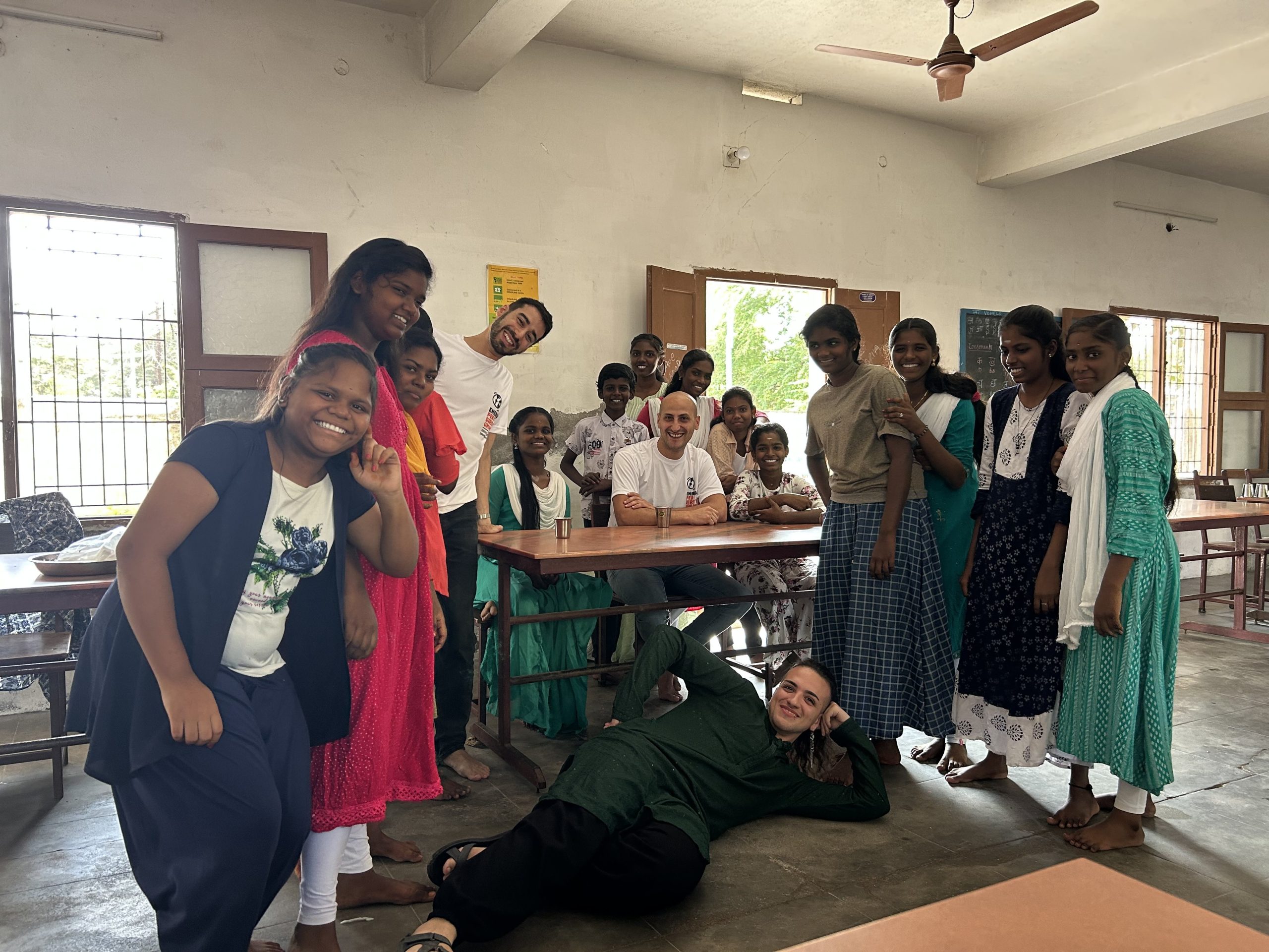 Energia volunteers Matthew, Luca and Leonardo with girls at Island of Hope
