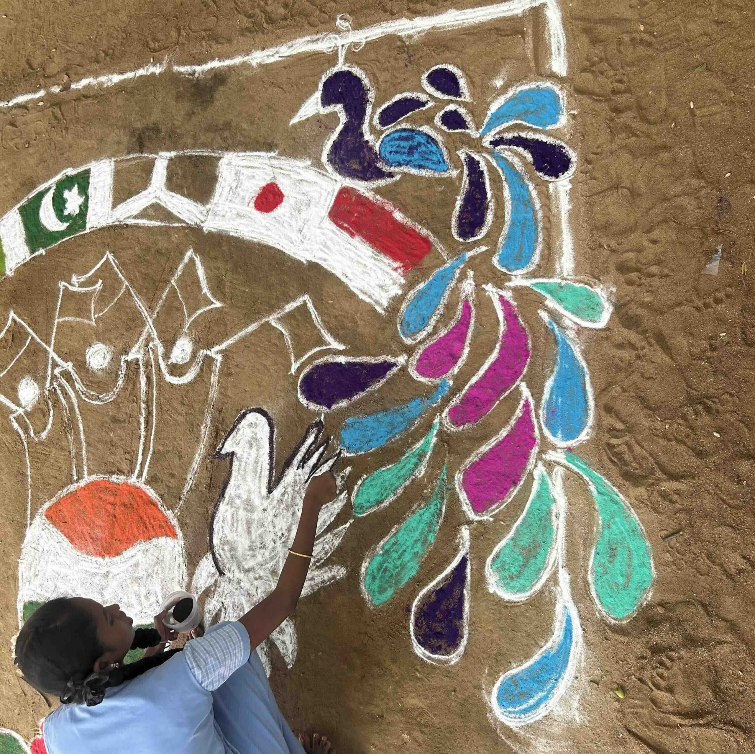 Peacock detail from a rangoli created for International Non-Violence Day