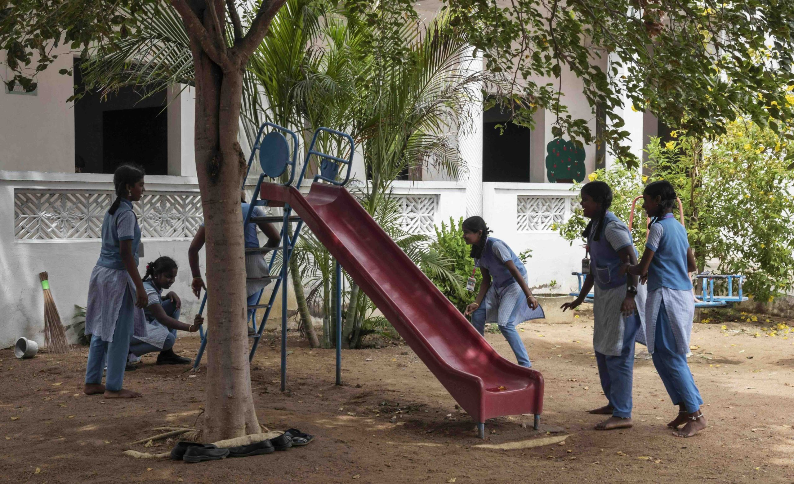 Students enjoying playtime in the school playground
