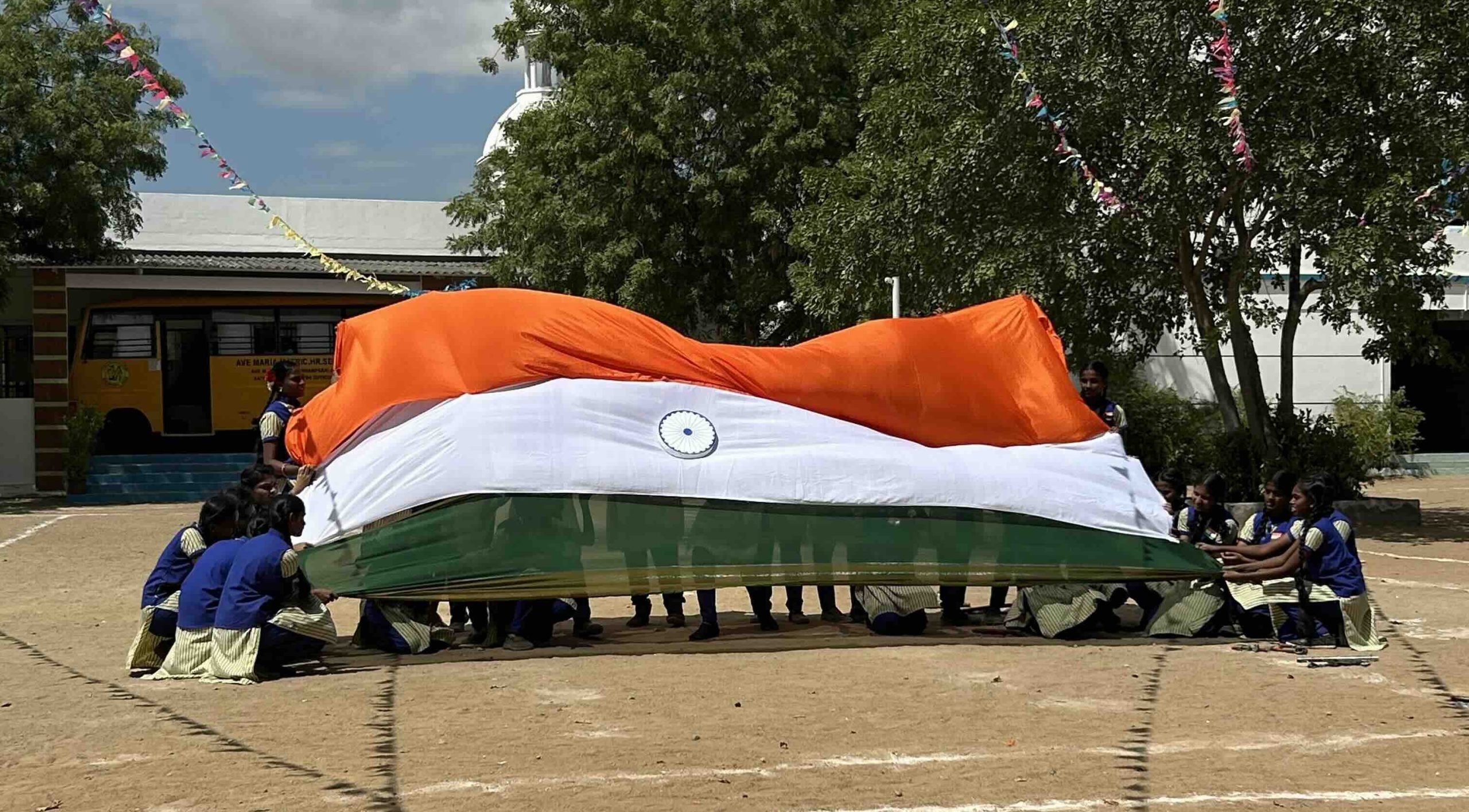 Students holding the Indian flag during Independence Day