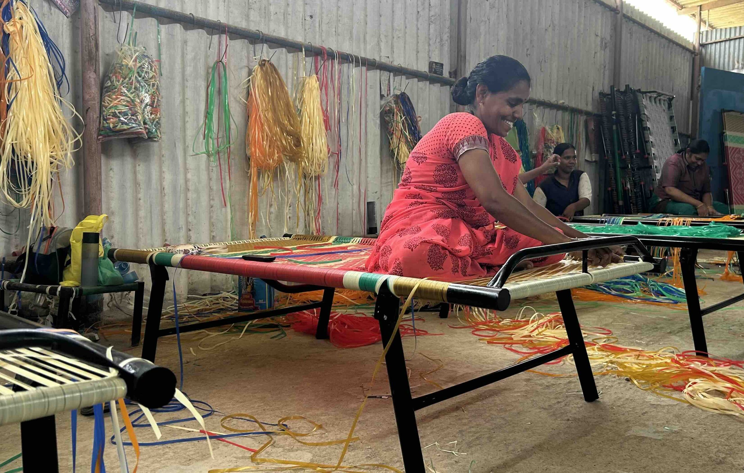 Woman handcrafting a patterned bed-net
