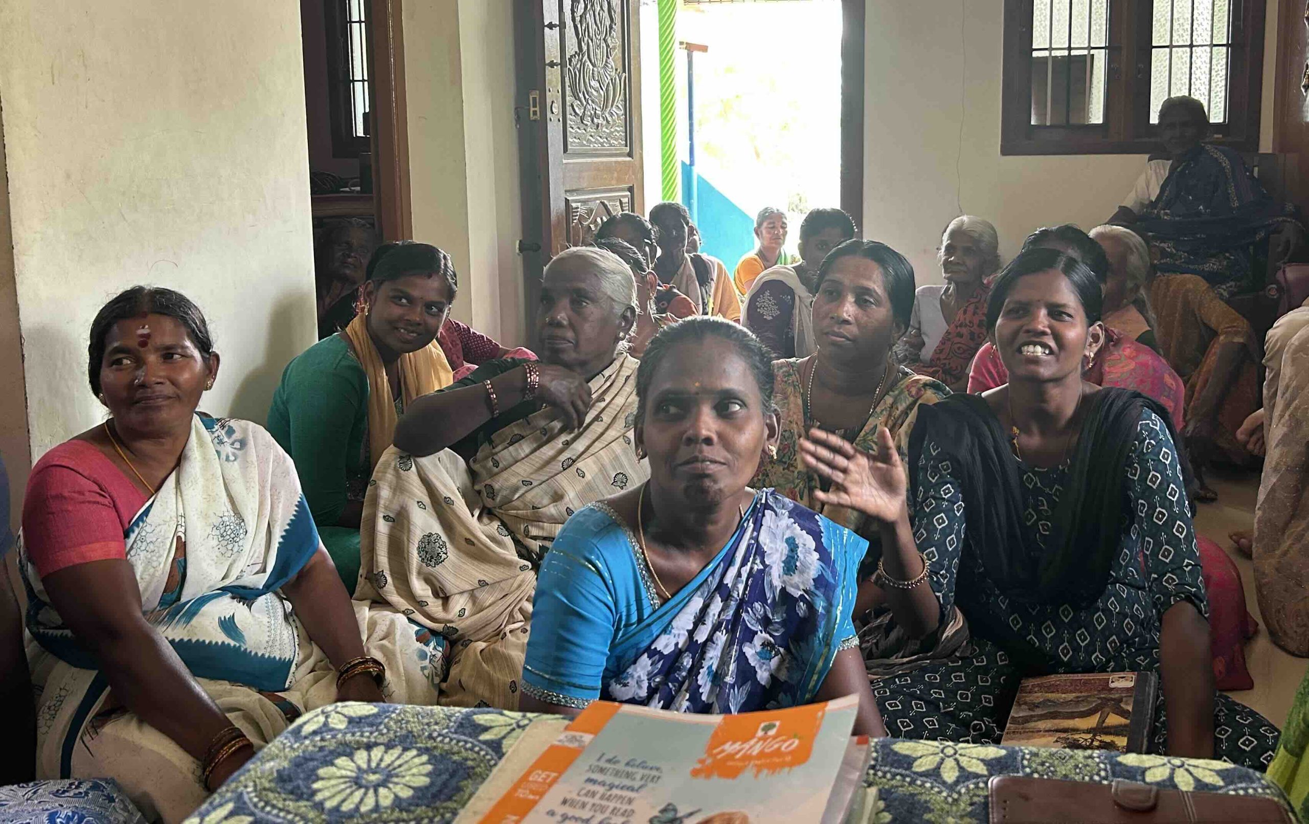 Women from the microcredit program gathered for a group meeting