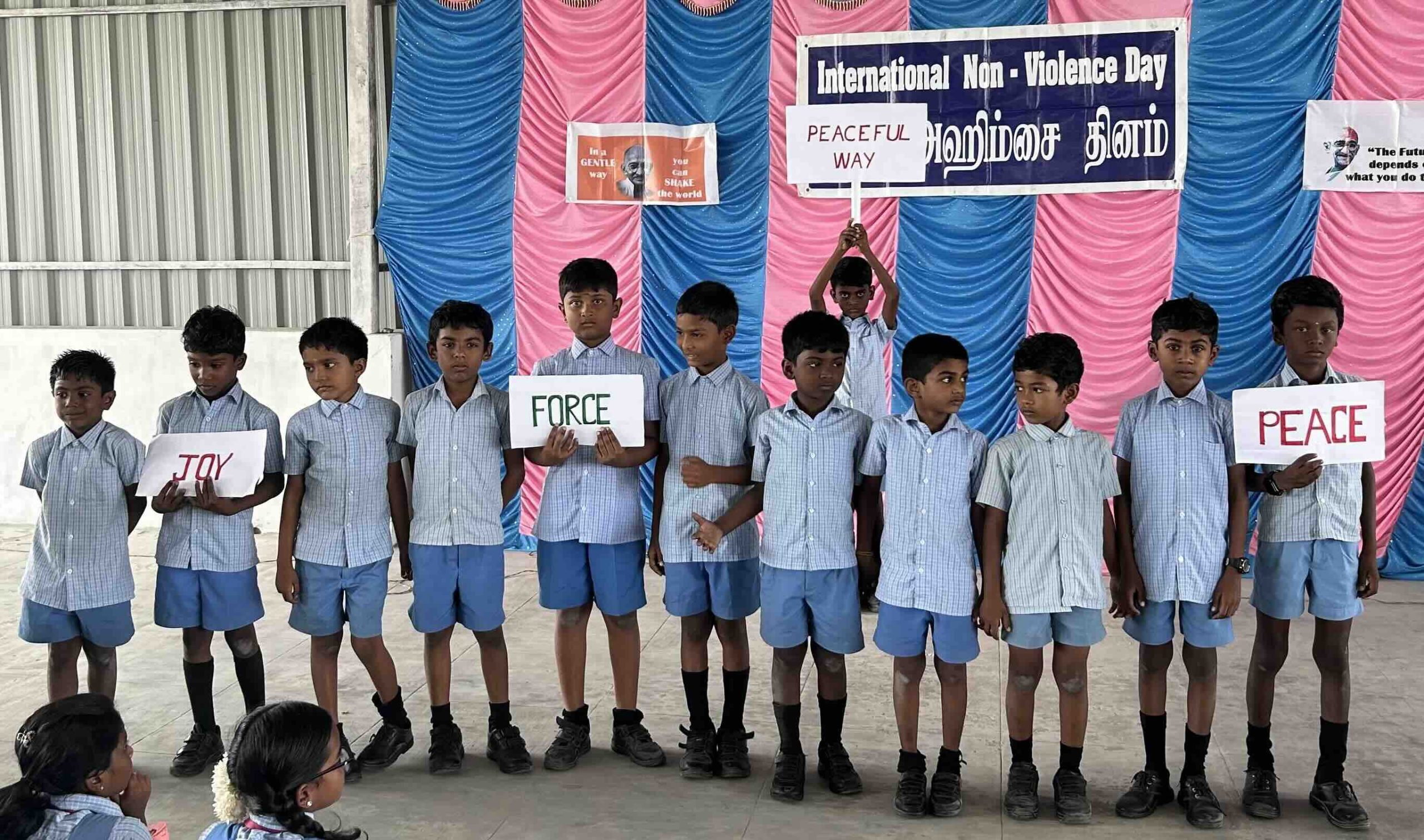 Primary students after demonstrating how to resolve conflicts in a peaceful way